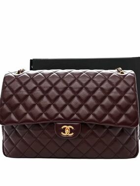 CHANEL Grained Calfskin Quilted XXL Travel Flap Bag in Burgundy Gold Hardware